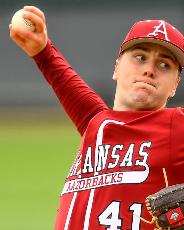 Arkansas Razorbacks Will McEntire on the bases against Eastern Illinois on Saturday afternoon.